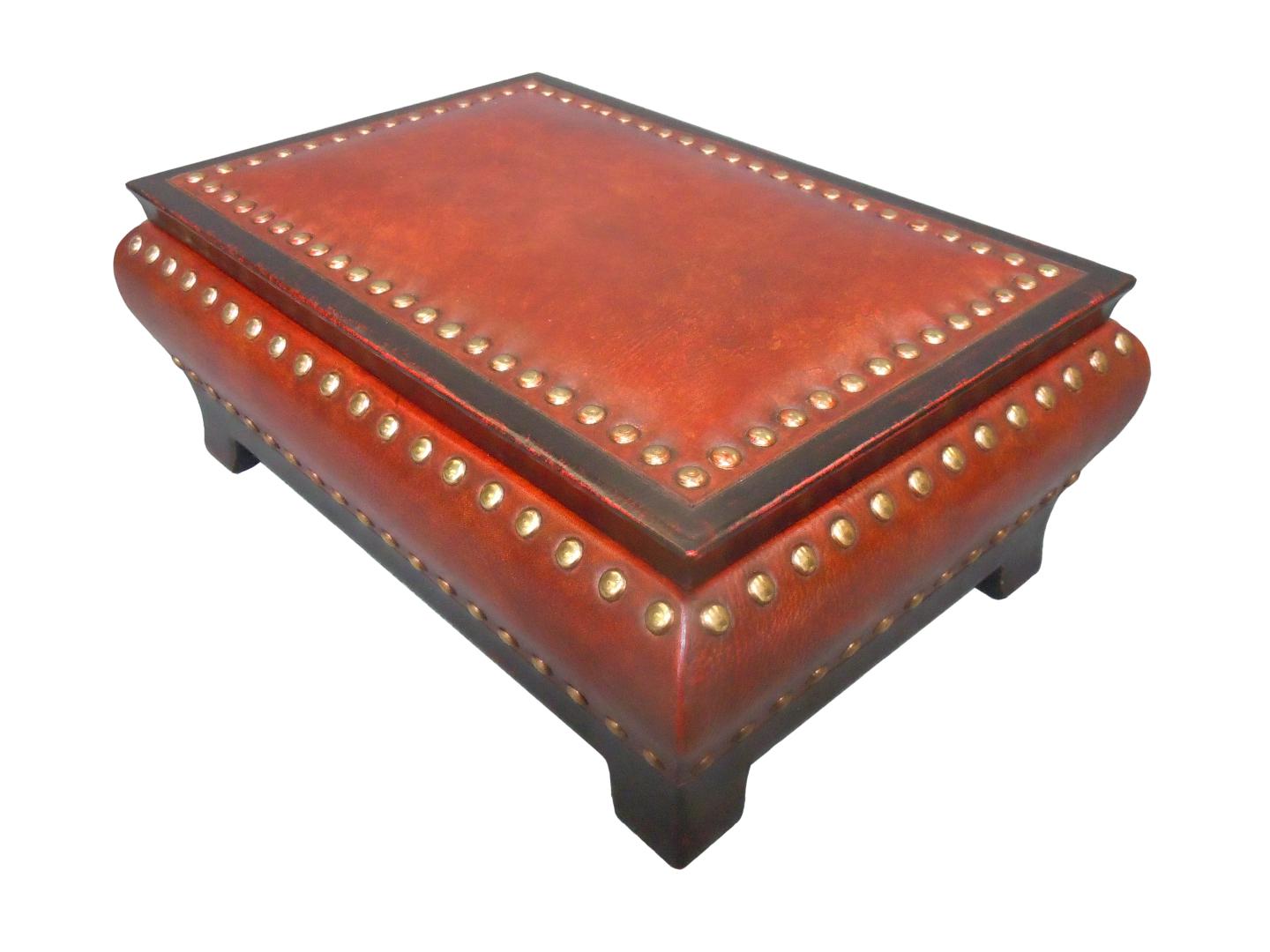 leather box with a rivets design on the top and around the piece